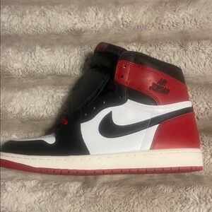 Jordan Black and White Sneakers with Red Accents